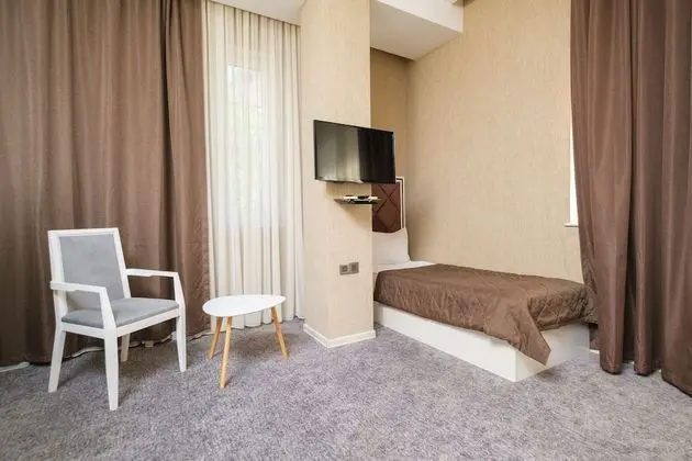 Üç Kişilik Oda