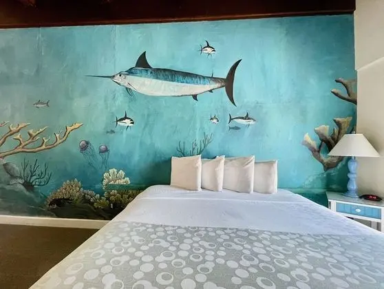 Deluxe Room with King Bed, Limited Ocean View, Balcony and Whirlpool Spa Tub