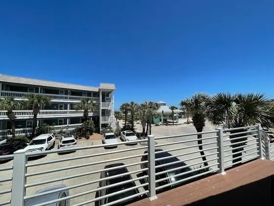 Deluxe Room with King Bed, Limited Ocean View, Balcony and Whirlpool Spa Tub