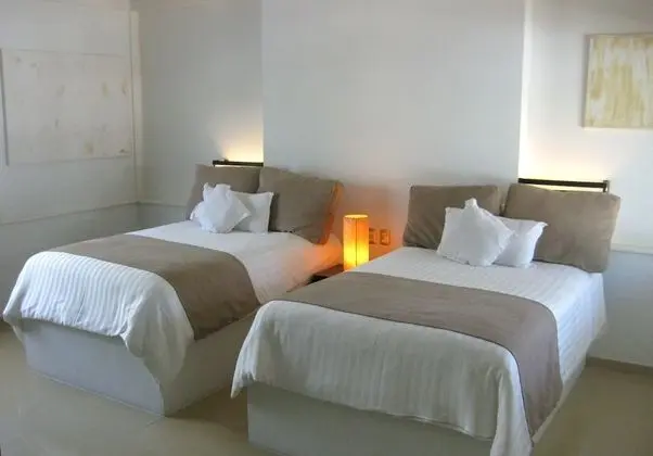 Two Double Beds with Buffet Breakfast, Spa Access and Daily Massage for Couples