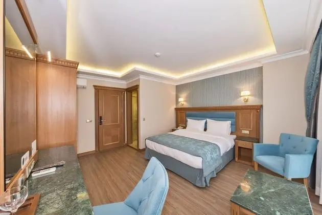 Deluxe Tek Büyük veya İki Ayrı Yataklı Oda