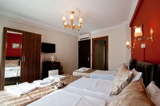 Üç Kişilik Oda