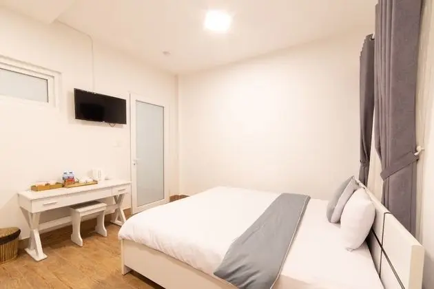 Deluxe Tek Büyük veya İki Ayrı Yataklı Oda