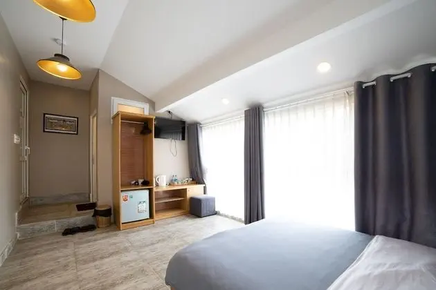 Deluxe Tek Büyük veya İki Ayrı Yataklı Oda