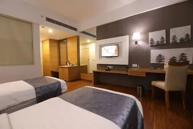 Deluxe Tek Büyük veya İki Ayrı Yataklı Oda