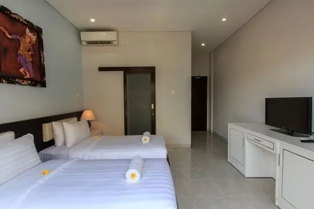 Deluxe Tek Büyük veya İki Ayrı Yataklı Oda