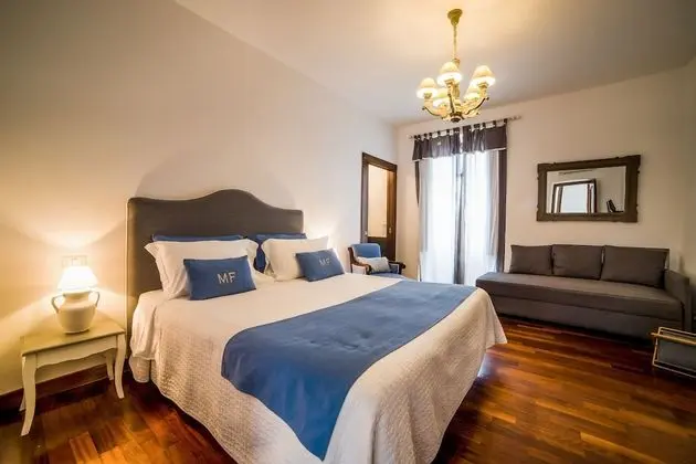 Deluxe Tek Büyük veya İki Ayrı Yataklı Oda
