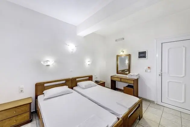 Small Twin Room - Window to Interior Corridor