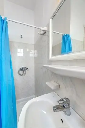Small Twin Room - Window to Interior Corridor