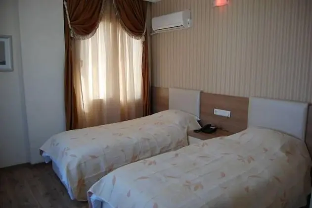 Üç Kişilik Oda