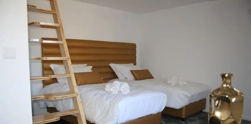 Deluxe Tek Büyük veya İki Ayrı Yataklı Oda