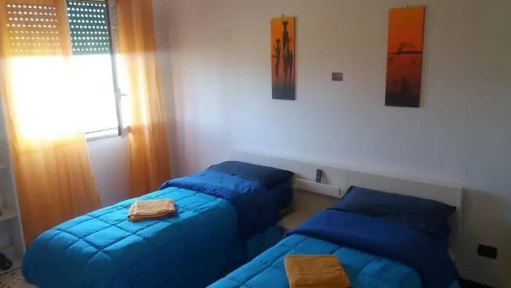 Tek Büyük veya İki Ayrı Yataklı Oda, Ortak Banyo