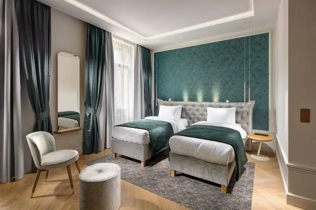 Deluxe Tek Büyük veya İki Ayrı Yataklı Oda