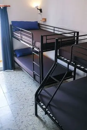 1 Cama en habitación compartida mixta, 4 camas, baño privado