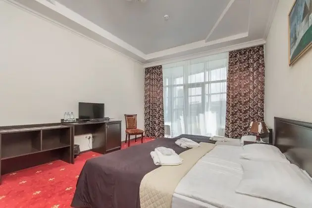 Comfort Tek Büyük veya İki Ayrı Yataklı Oda