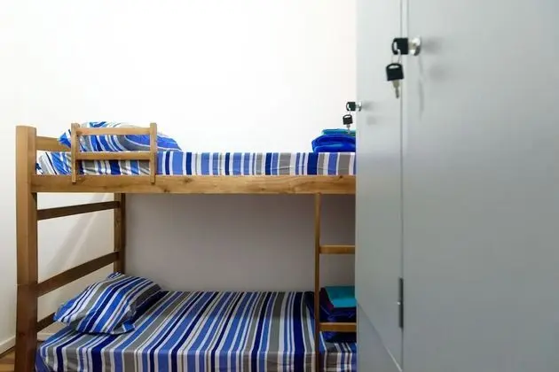 Dormitorio Misto, 8 camas, banheiro compartilhado