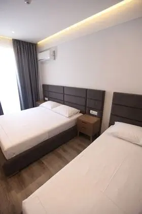 Üç Kişilik Oda