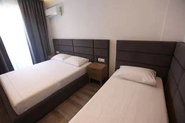 Üç Kişilik Oda
