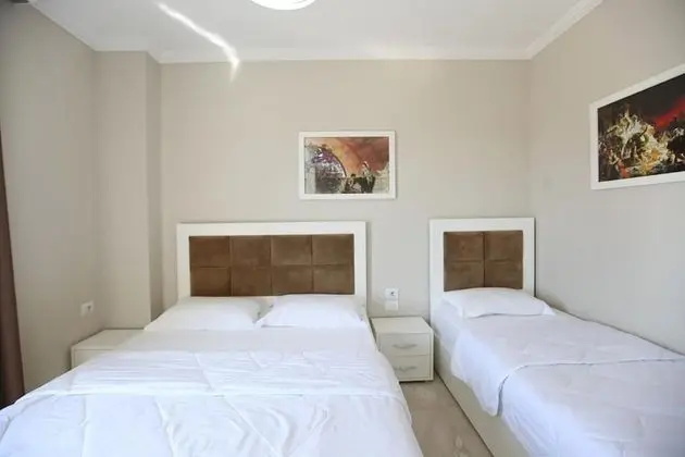 Üç Kişilik Oda