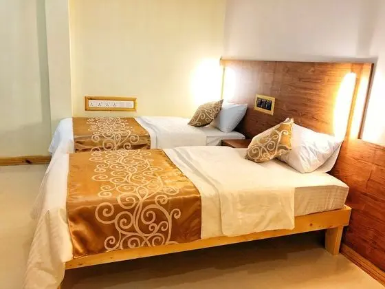 Deluxe Tek Büyük veya İki Ayrı Yataklı Oda