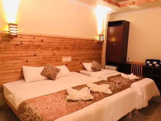 Deluxe Üç Kişilik Oda