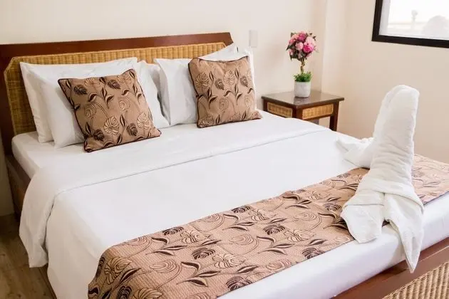 Deluxe Tek Büyük Yataklı Oda (2 Adults + 1 Child)