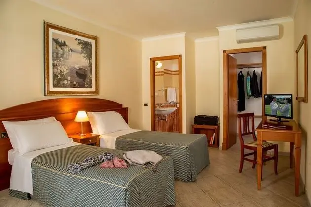 Economy Tek Büyük veya İki Ayrı Yataklı Oda