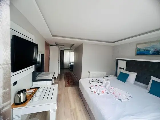Deluxe Üç Kişilik Oda, Balkon, Deniz Manzaralı