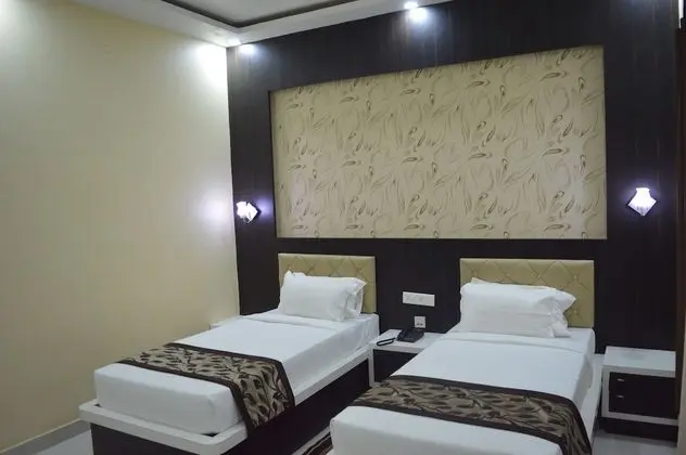 Deluxe Tek Büyük veya İki Ayrı Yataklı Oda