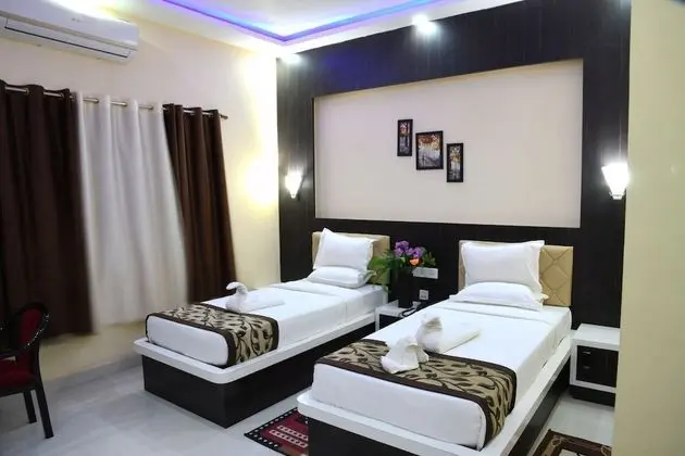 Deluxe Tek Büyük veya İki Ayrı Yataklı Oda