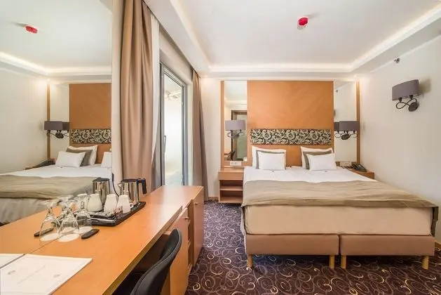 Deluxe Tek Büyük veya İki Ayrı Yataklı Oda