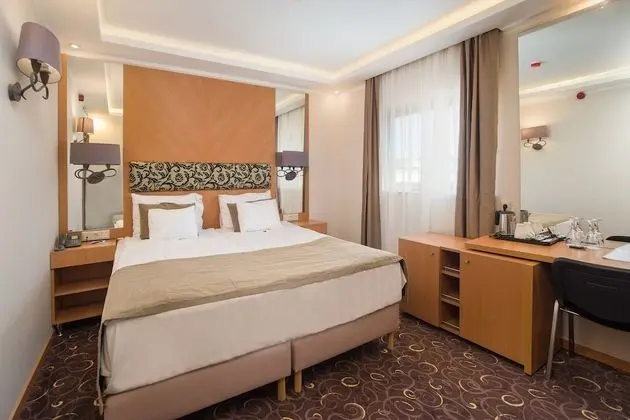 Deluxe Tek Büyük veya İki Ayrı Yataklı Oda