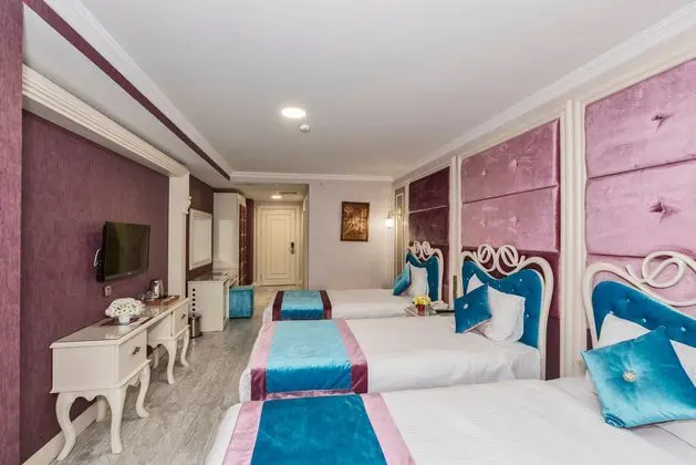 Deluxe Triple Oda Sehir Manzarali
