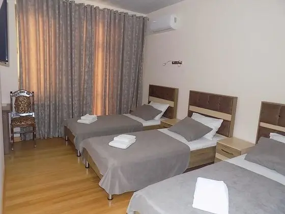 Üç Kişilik Oda