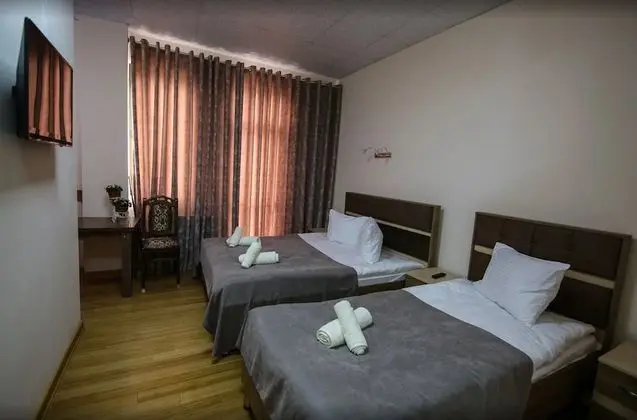Üç Kişilik Oda