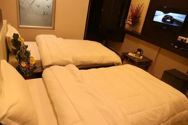 Deluxe Tek Büyük veya İki Ayrı Yataklı Oda