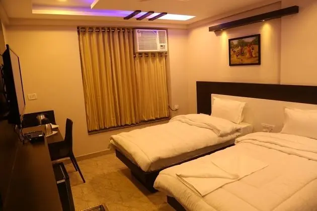 Deluxe Tek Büyük veya İki Ayrı Yataklı Oda