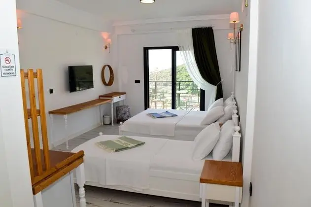 Deluxe Üç Kişilik Oda , Deniz ve Doğa Manzaralı, Balkonlu