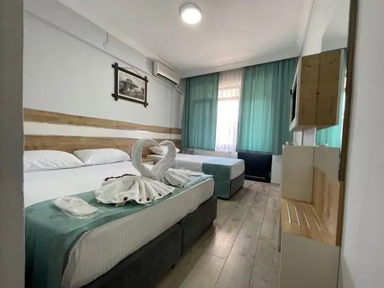 Üç Kişilik Oda