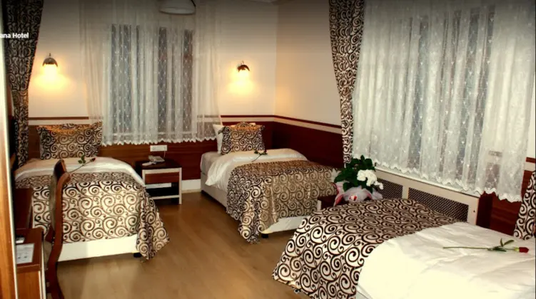 Üç Kişilik Oda