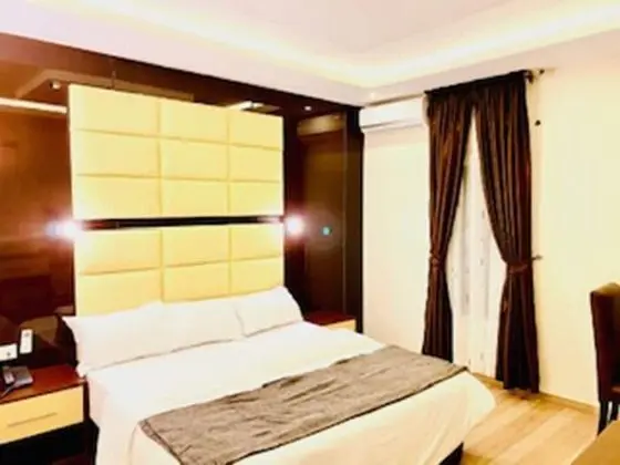 Deluxe Tek Büyük veya İki Ayrı Yataklı Oda