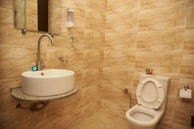 Deluxe Tek Büyük veya İki Ayrı Yataklı Oda