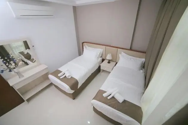 Deluxe Tek Büyük veya İki Ayrı Yataklı Oda