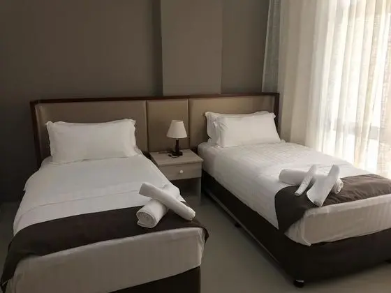 Deluxe Tek Büyük veya İki Ayrı Yataklı Oda