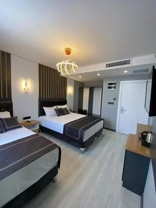 Deluxe Üç Kişilik Oda