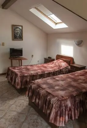 Deluxe Tek Büyük veya İki Ayrı Yataklı Oda