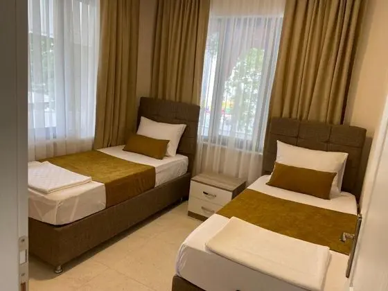 Suite - İki Yatak Odalı, Deniz veya Bahçe Manzaralı, 2. Kat