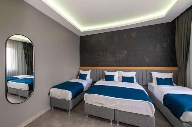 Deluxe Dört Kişilik Oda