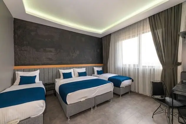 Deluxe Dört Kişilik Oda