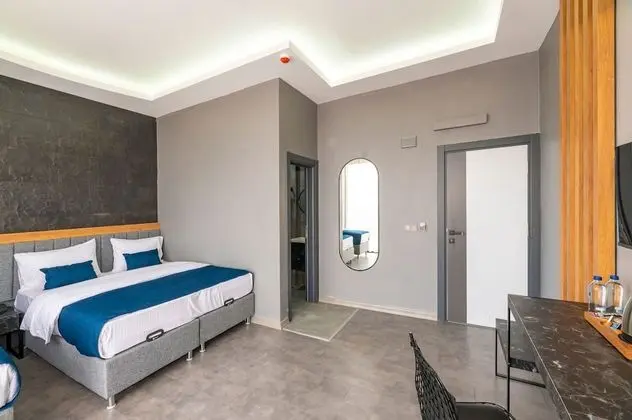Deluxe Tek Büyük veya İki Ayrı Yataklı Oda